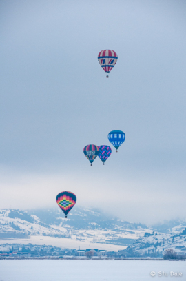 Balloons flying over Swan Lake